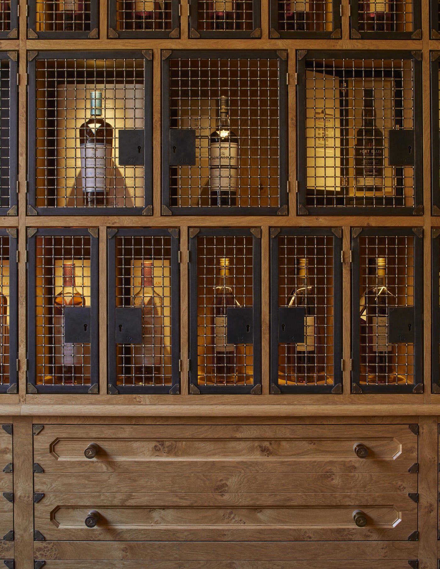 Custom private club room with bespoke collector cabinetry